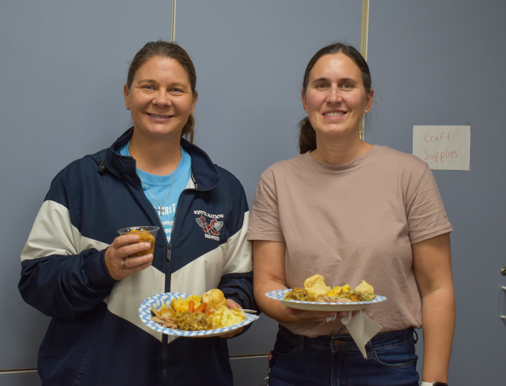 teachers with plates of food