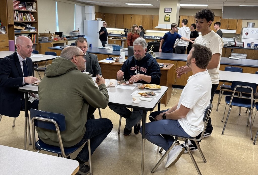 teachers eating meal in classroom