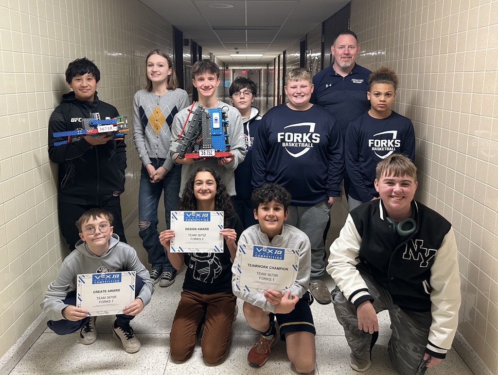 robotics team with awards and robots