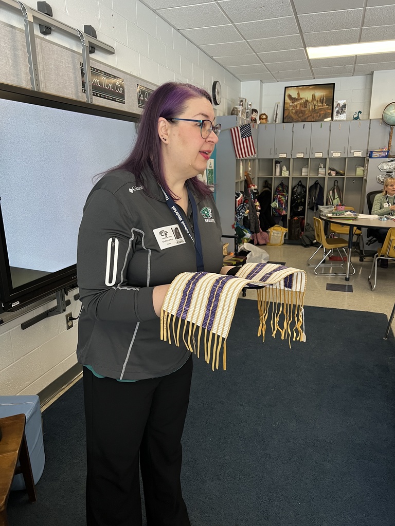guest speaker with replica wampum belt