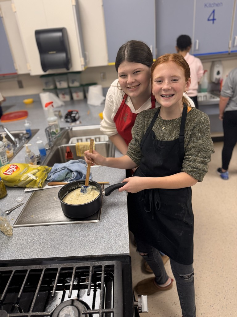 students making mac and cheese
