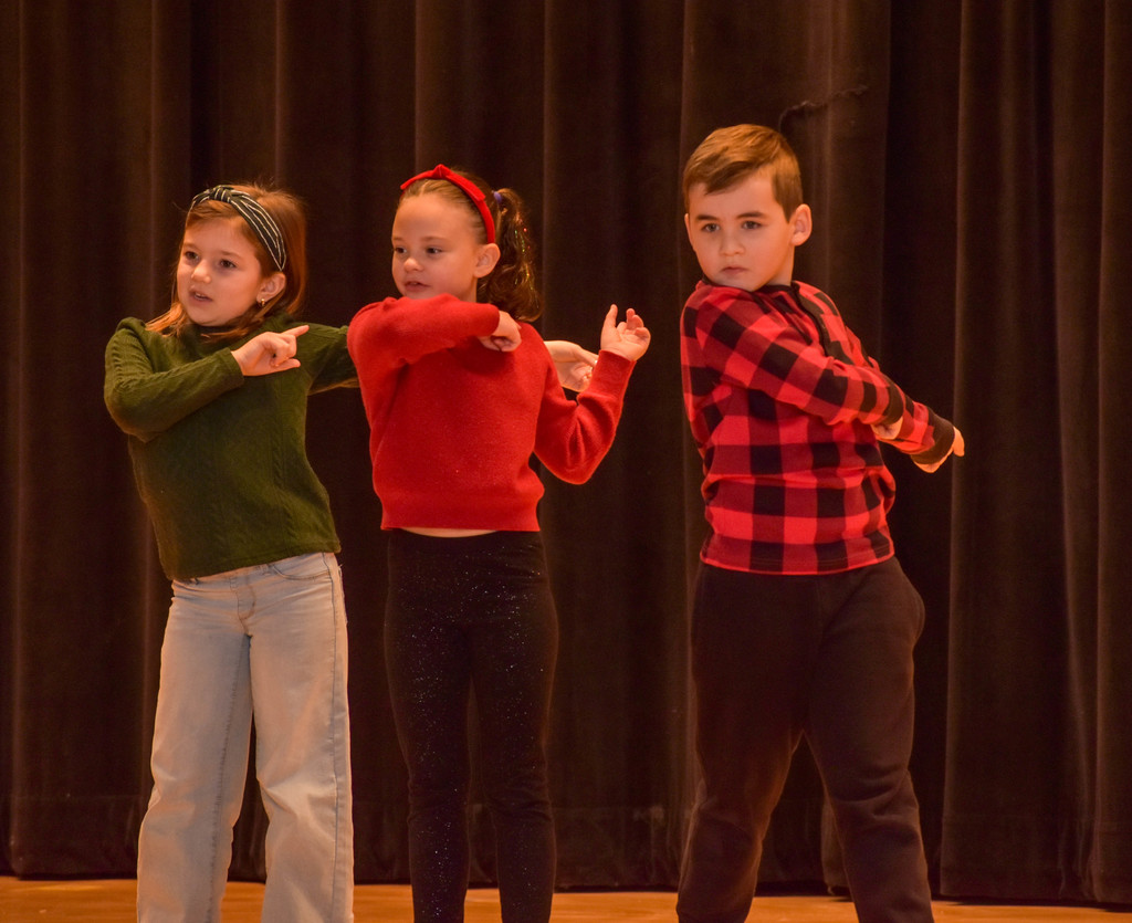 elementary student during holiday performance