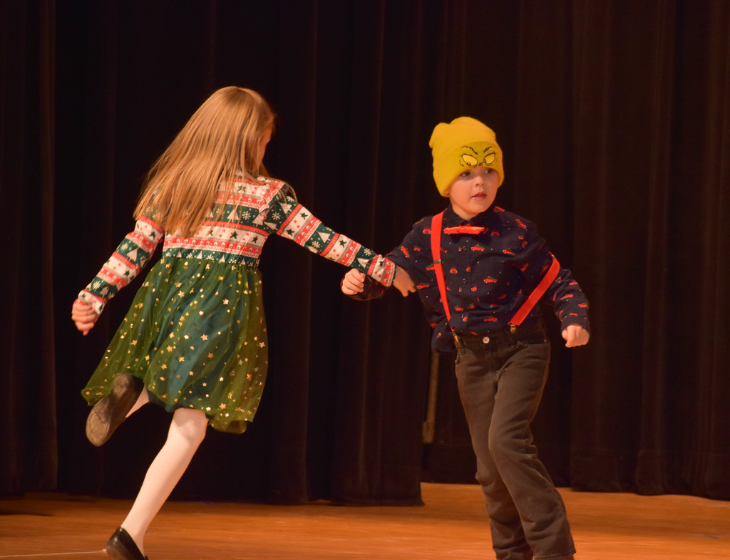 elementary student during holiday performance