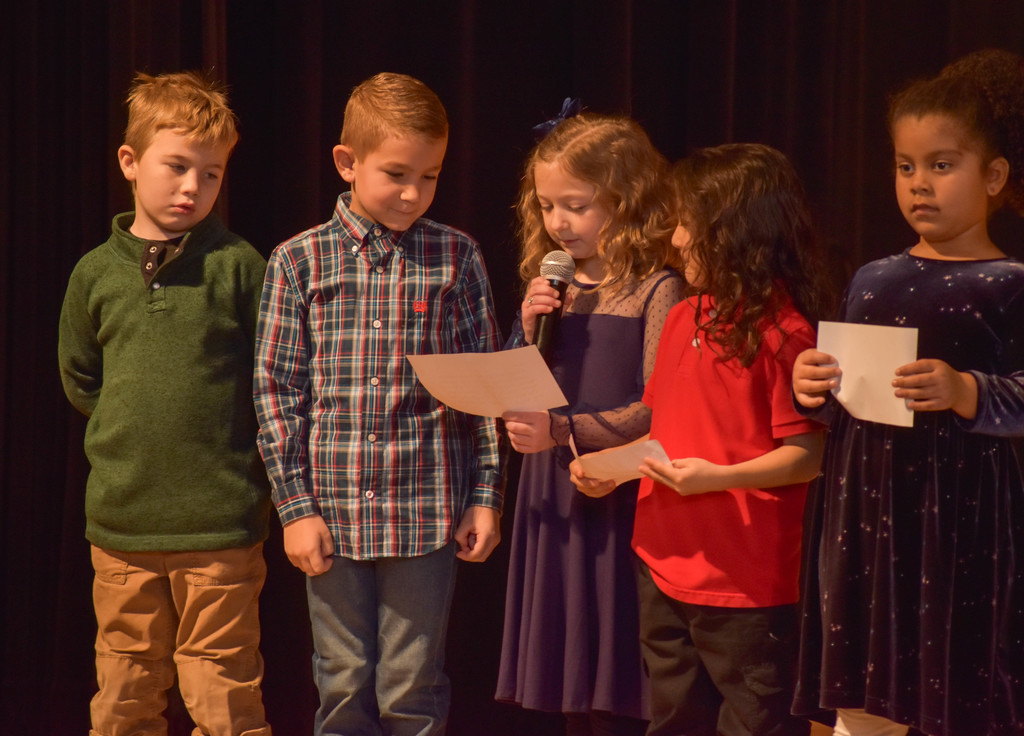 elementary student during holiday performance