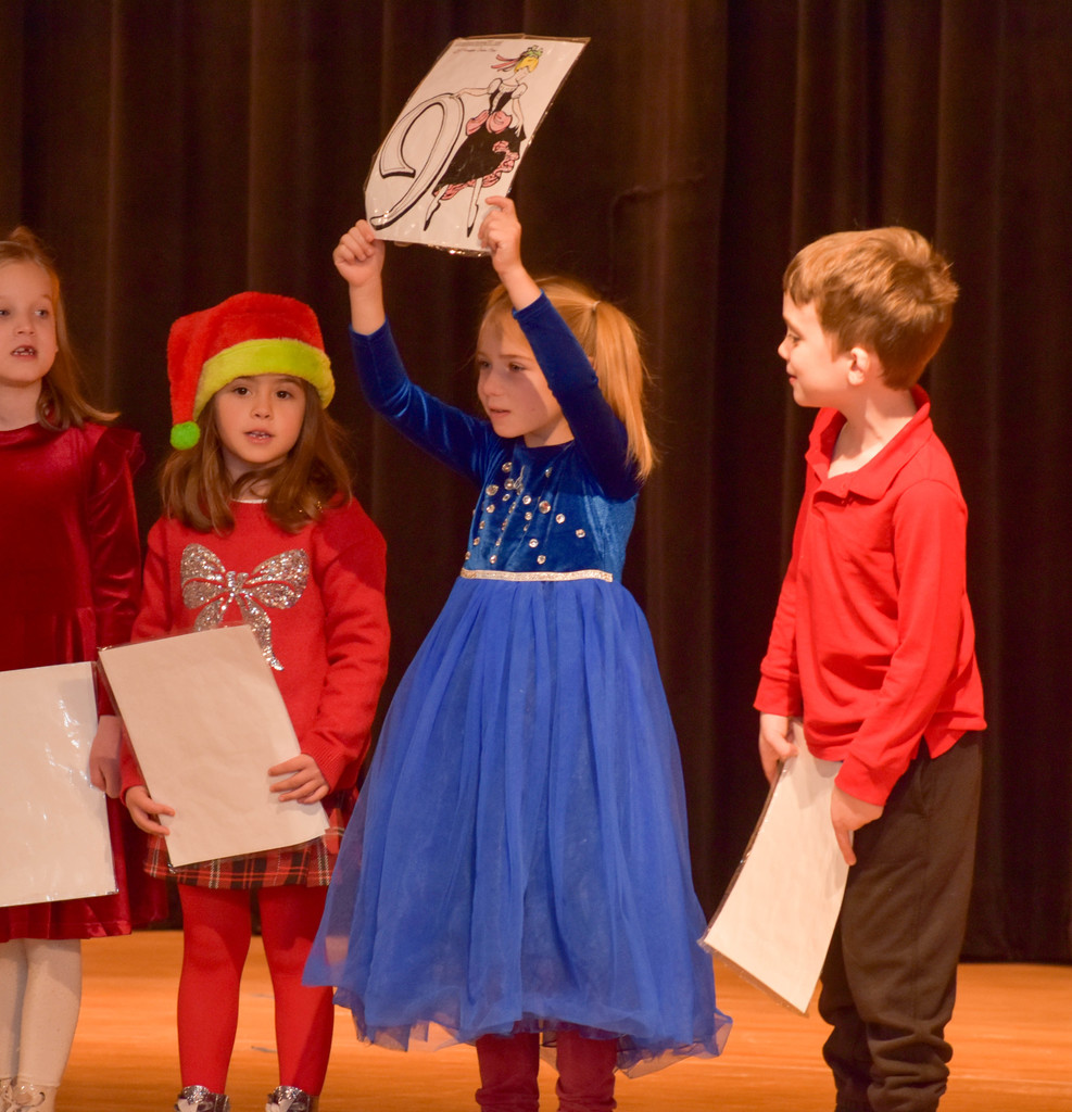 elementary student during holiday performance