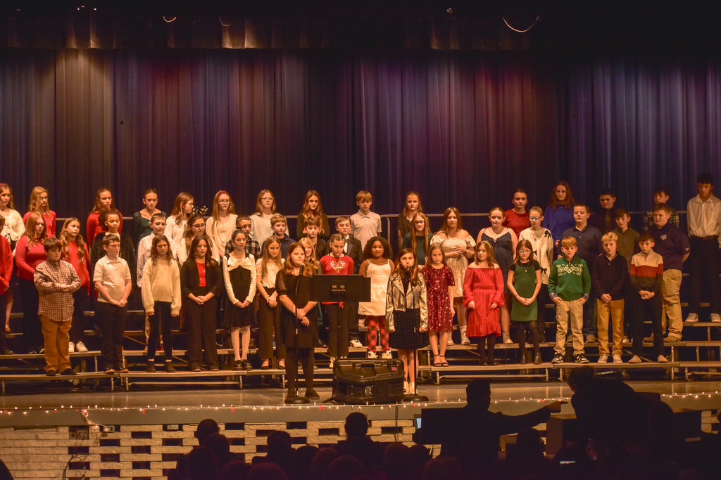 students singing at chorus concert