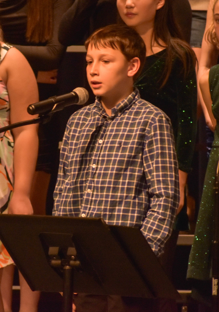 students singing at chorus concert