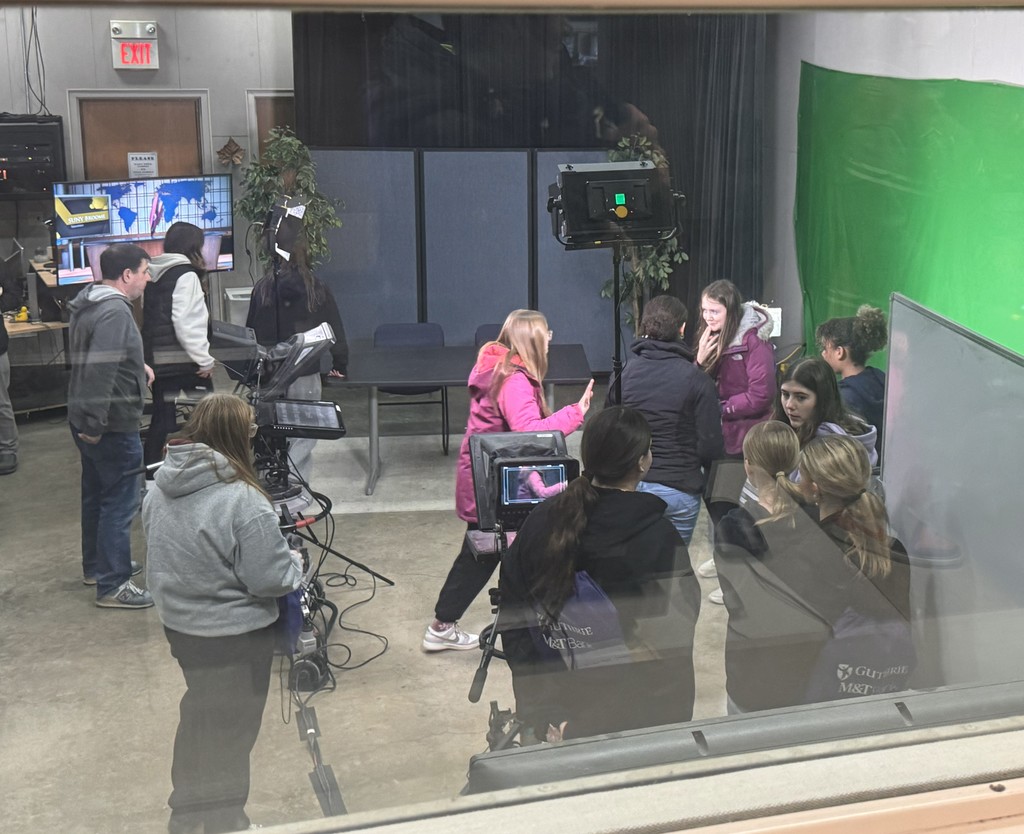 student in TV production studio