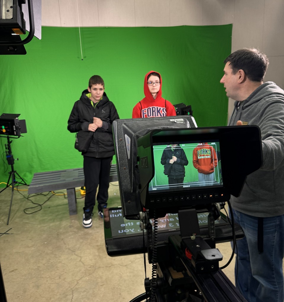 student in TV production studio