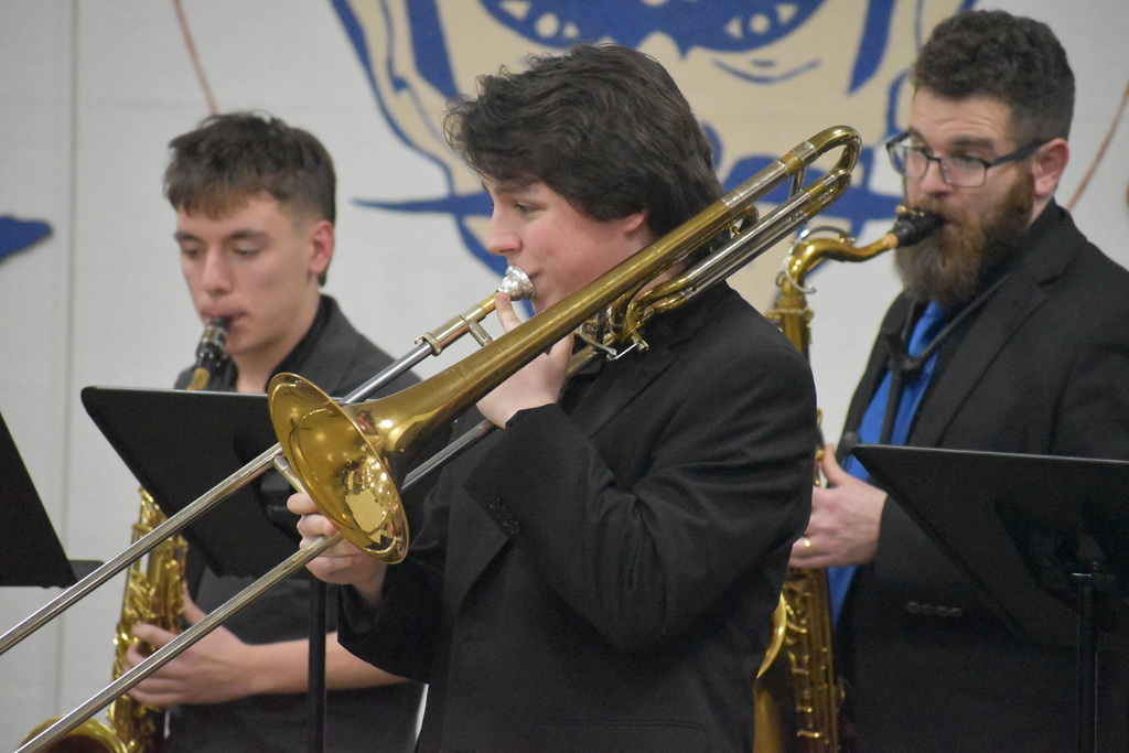 student playing trombone