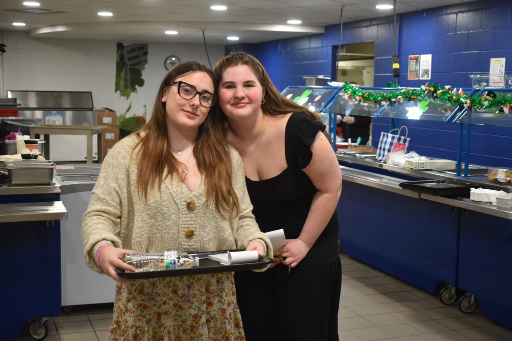 students serving dessert