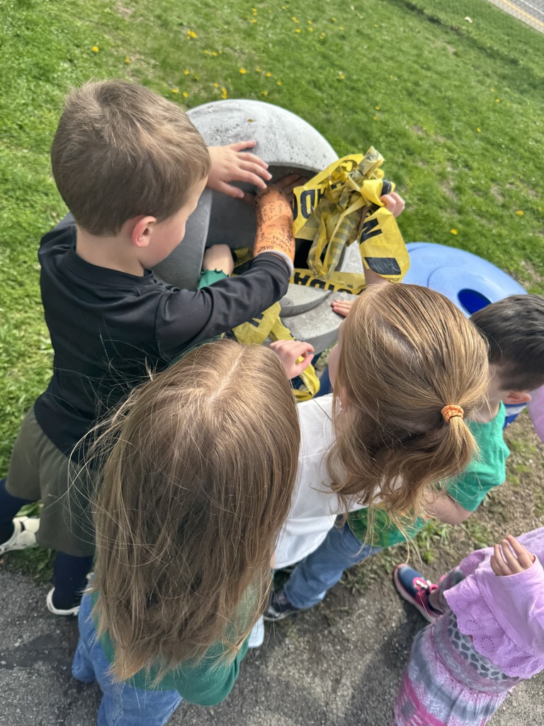 student planting flower seeds
