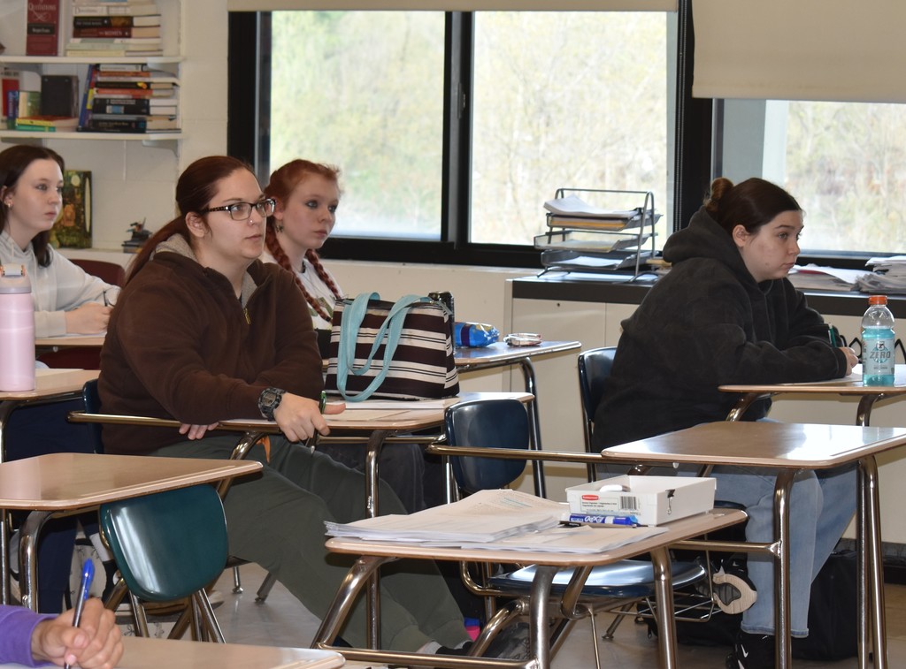 students at desks in classroom