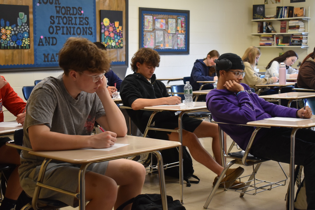 students at desks in classroom