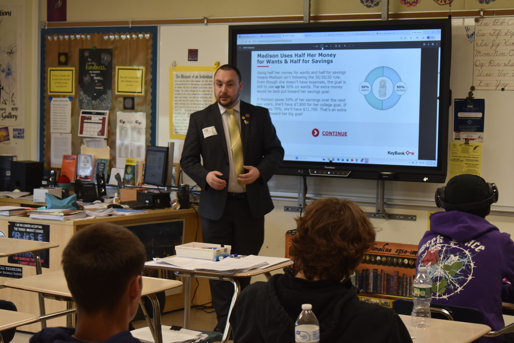 bank manager speaking to class
