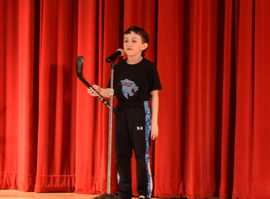 elementary student on stage