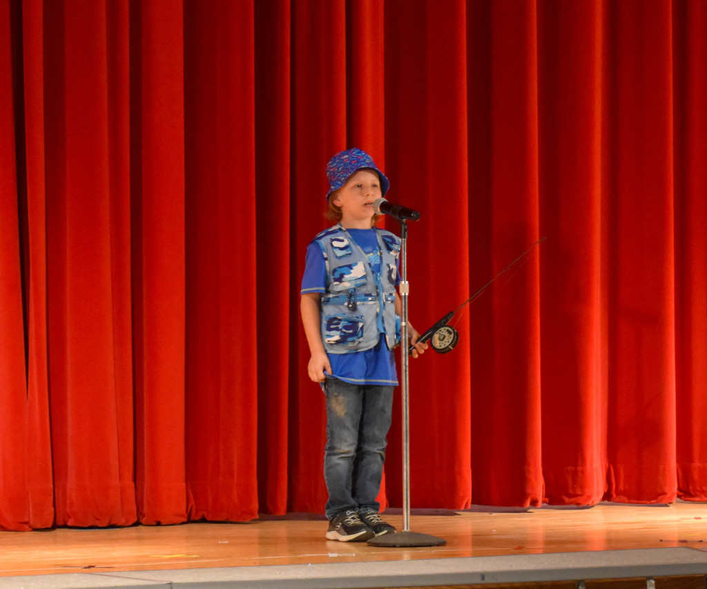 elementary student on stage