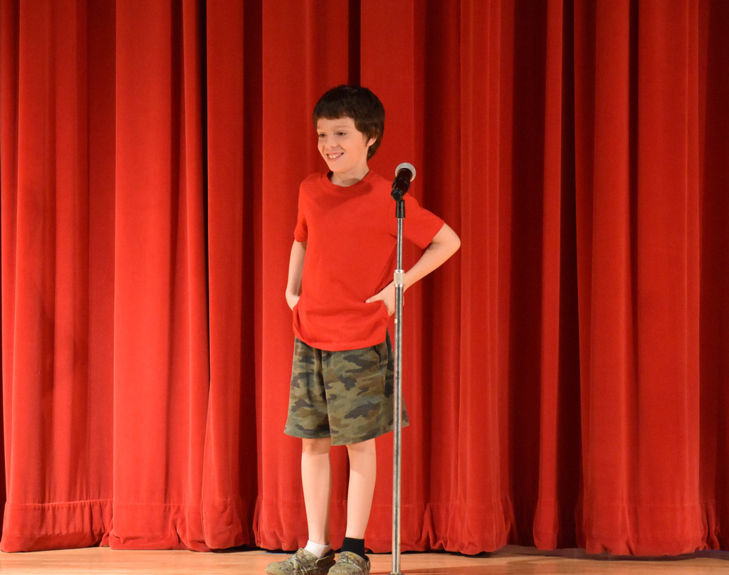 elementary student on stage