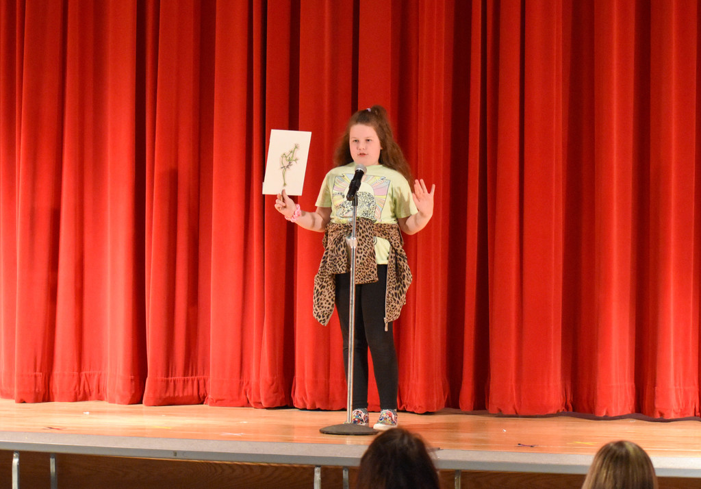 elementary student on stage