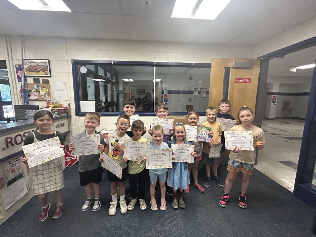 elementary students with awards