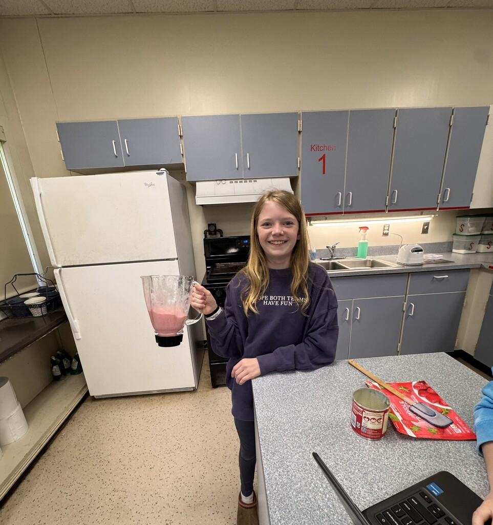 student with blender