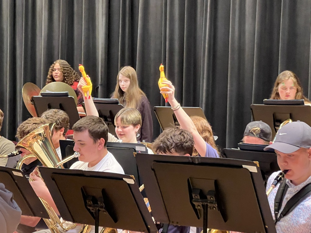 high school band performaning for elementary students 