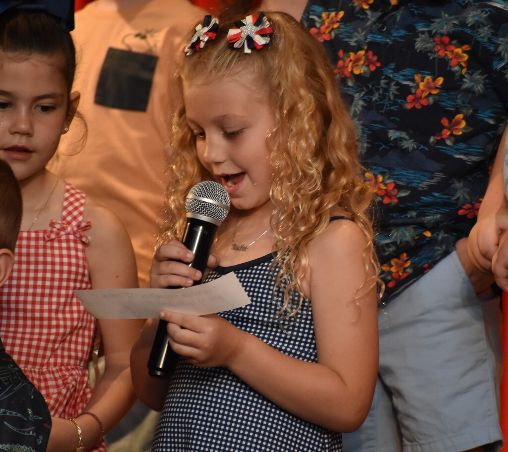 ELEMENTARY STUDENT DURING MEMORIAL DAY ASSEMBLY 