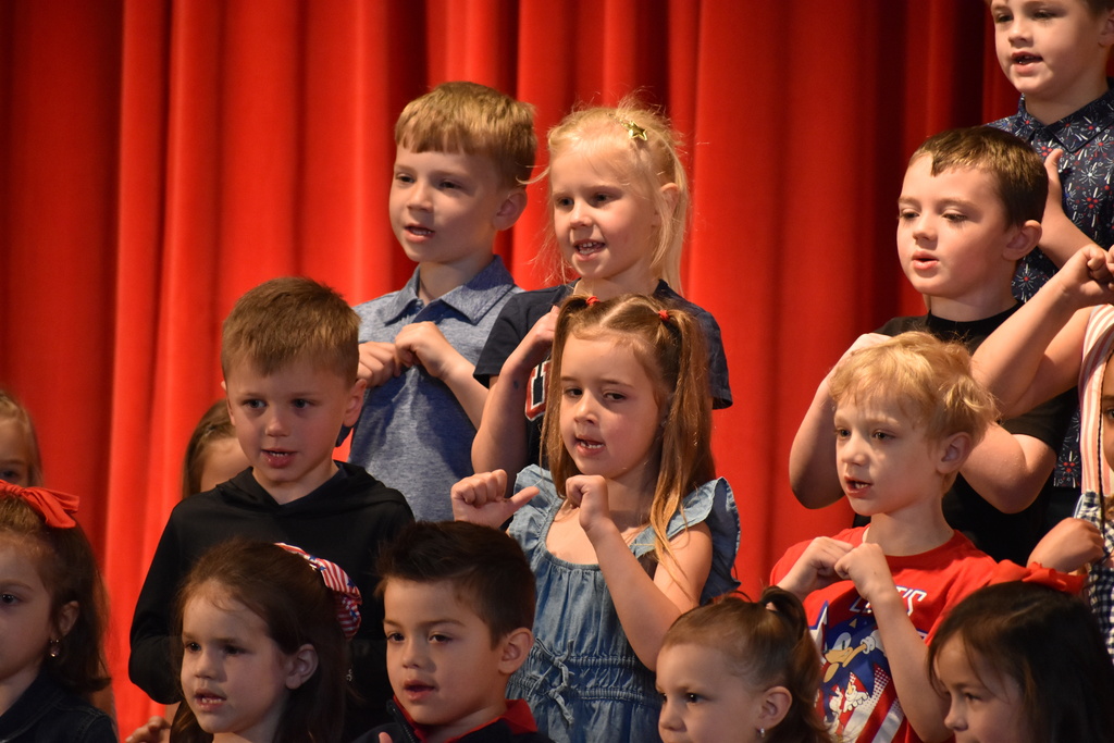 ELEMENTARY STUDENT DURING MEMORIAL DAY ASSEMBLY 