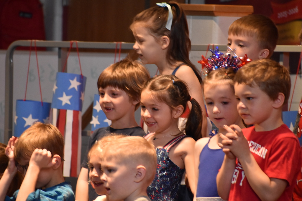 ELEMENTARY STUDENT DURING MEMORIAL DAY ASSEMBLY 