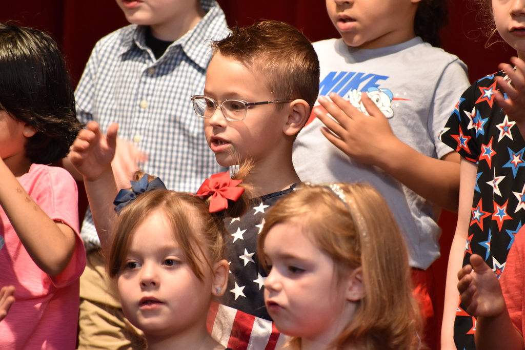 ELEMENTARY STUDENT DURING MEMORIAL DAY ASSEMBLY 