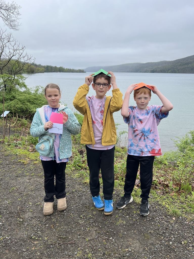 elementary students in front of school