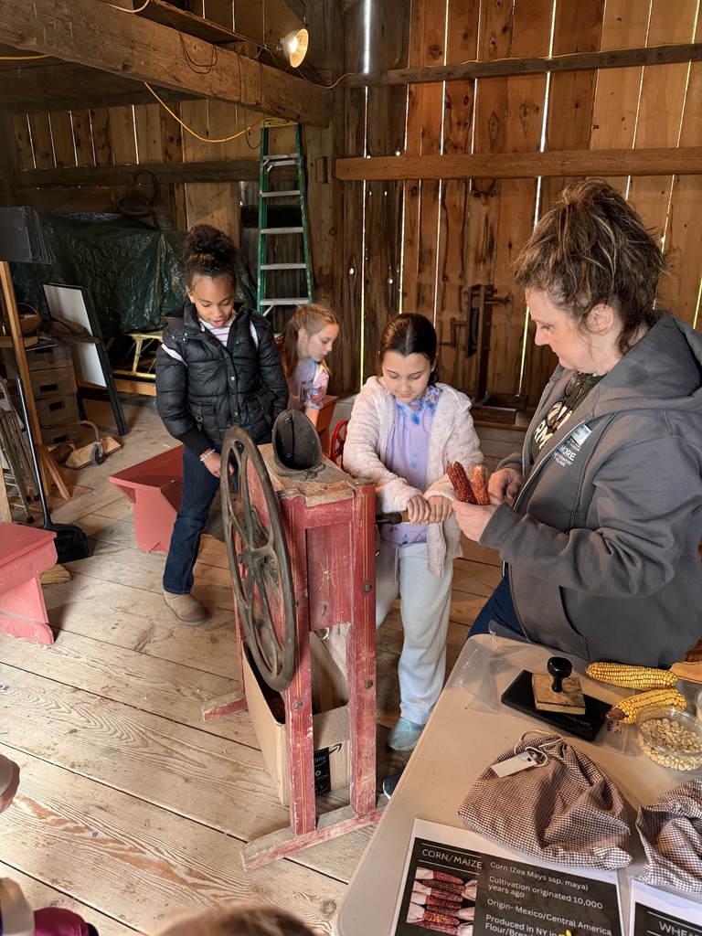 elementary students  in old village shop