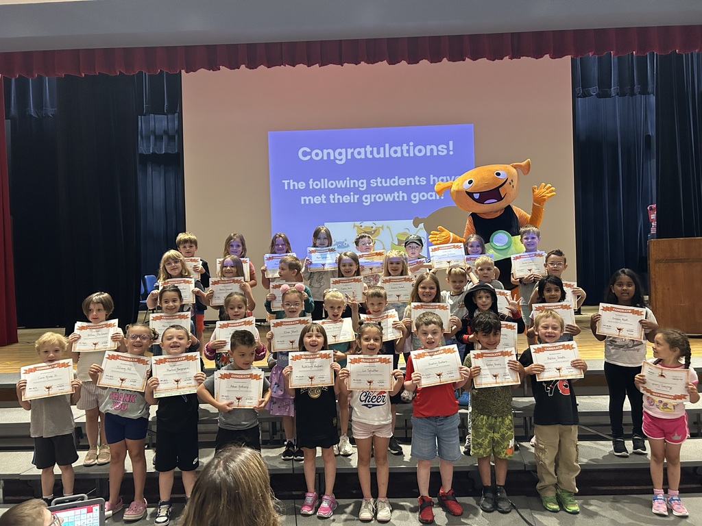 elementary students with awards