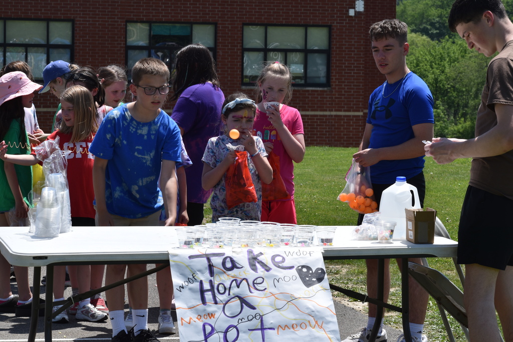 elementary students playing carnival games