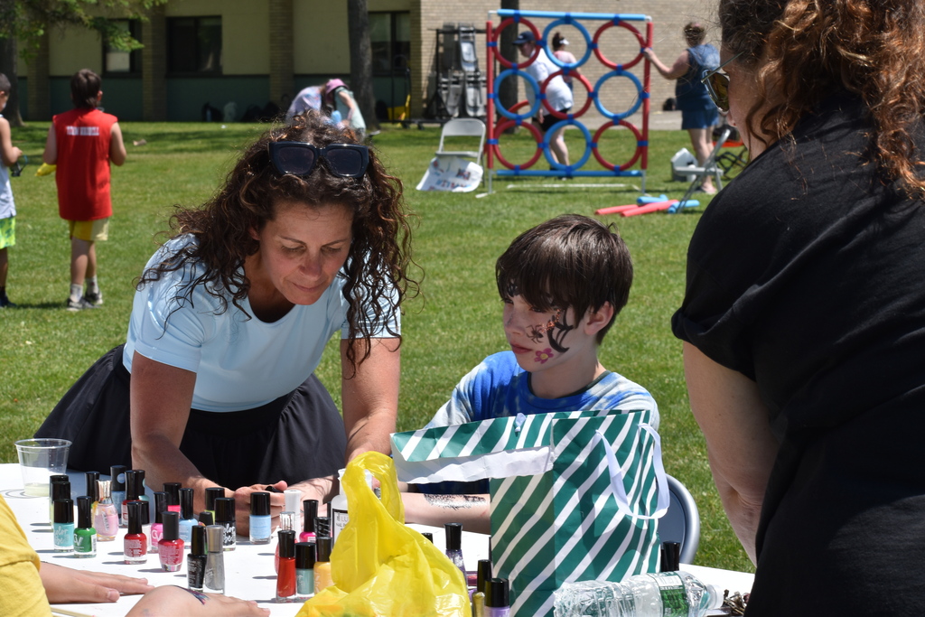 student getting face painted