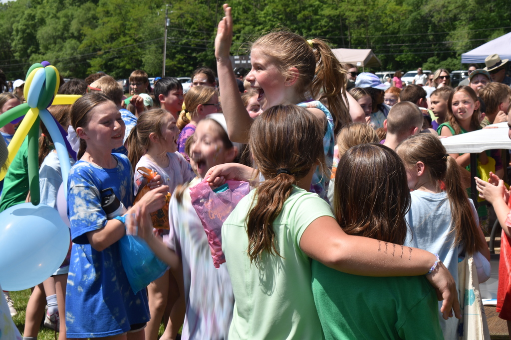 group of students cheering
