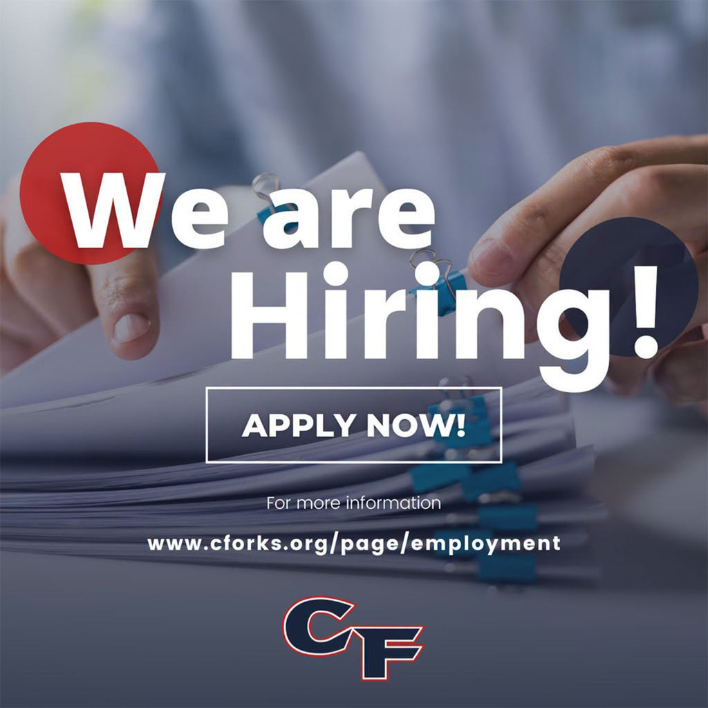 We are Hiring graphic that shows hands holding papers.