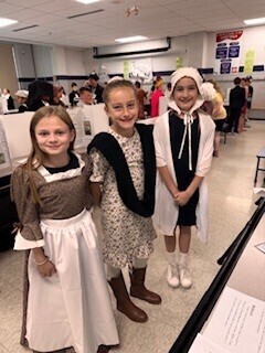 elementary students dressed as historical figure