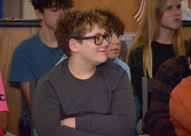 student smiling during presentation