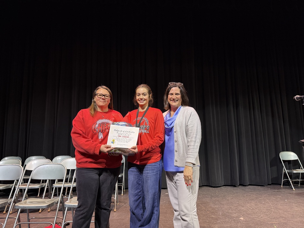 Photo of 3 people at the spelling bee Jan 2026. High School Level.