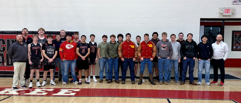Picture of 2 students receiving Class B2 All Star jacket for the 2025 Varsity Football Season along with the rest of them team and coaches..