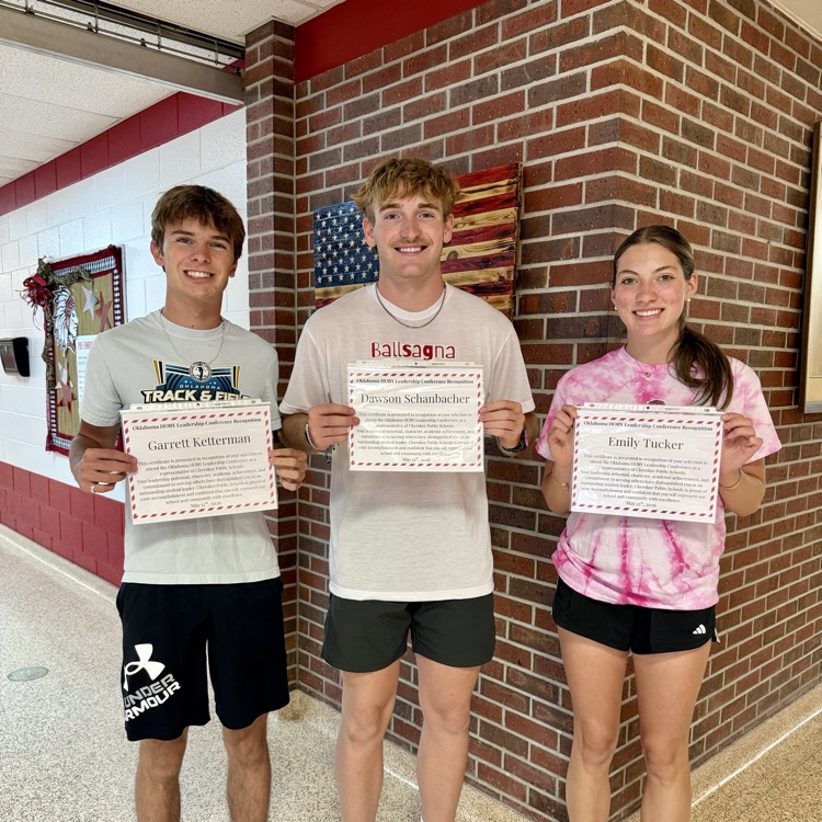photo of 2 male & 1 female student holding a certificate about the Hugh O'Brian Youth Leadership camp