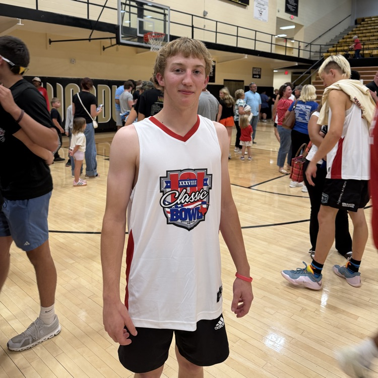 photo of male student on a basketball court