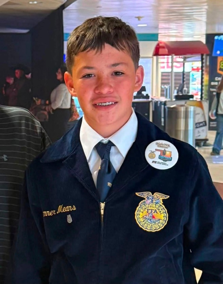 photo of a male student in an FFA Jacket