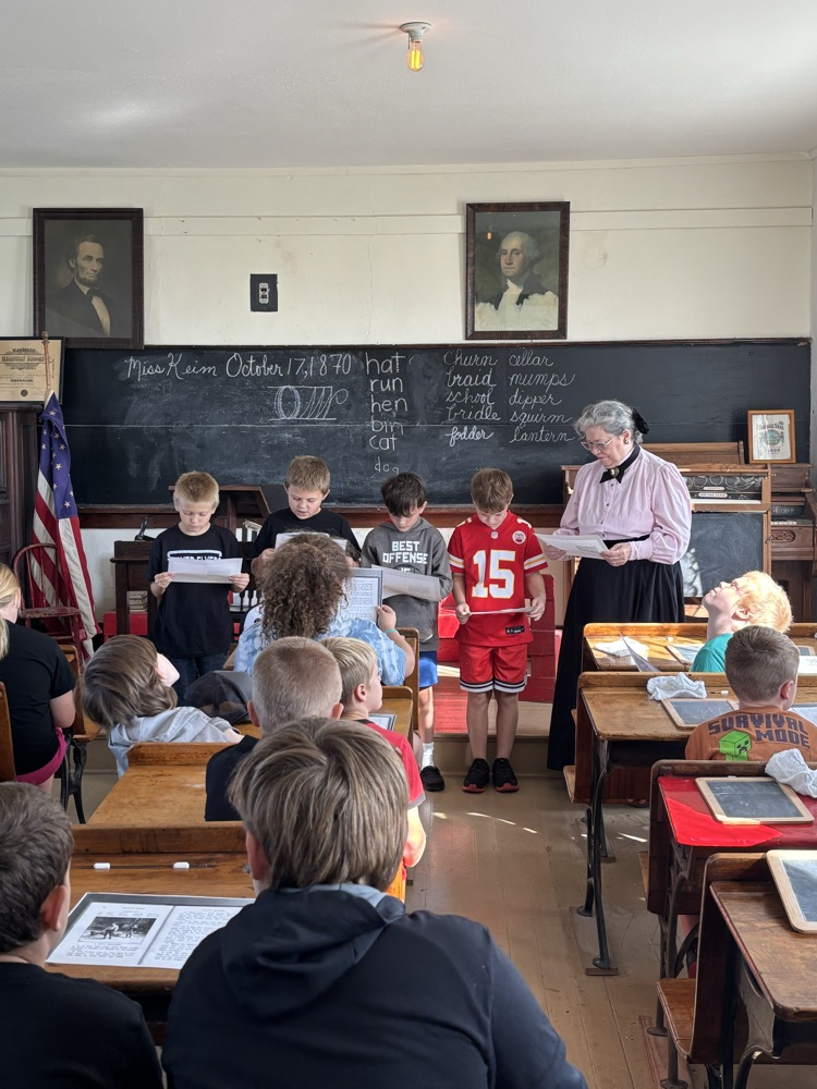 Students reading a story aloud to the group!