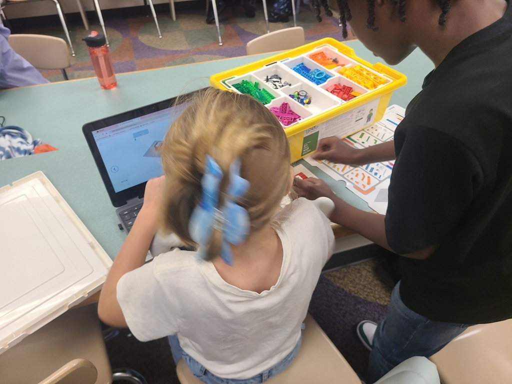 Mrs. Hardesty's 3rd graders building Carnival rides using Lego robotic kits while learning about simple and complex machines.