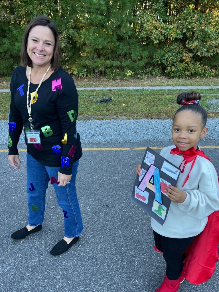 Teacher and student in parade