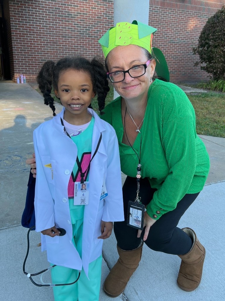 Teacher and student in parade