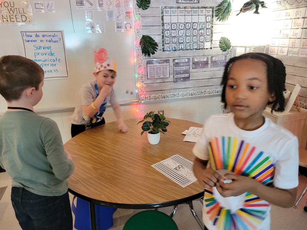 Take a peek at some "100 Days of School" fun in Miss Stafford's class today! They went on a scavenger hunt around the classroom to find 100 hearts, wrote about what they would do if they had $100, and colored some mystery pictures on a 100s chart! 💯❤️