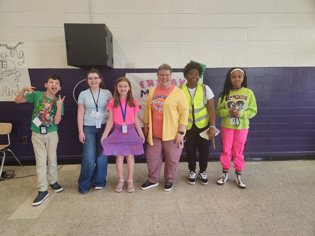 Students and teachers wearing bright colors.